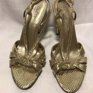Guess by Marciano snake skin print gold high heels